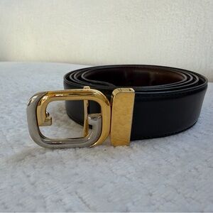 AUTHENTIC Vintage 70’s GUCCI Black Leather Belt with Gold and Silver Buckle.